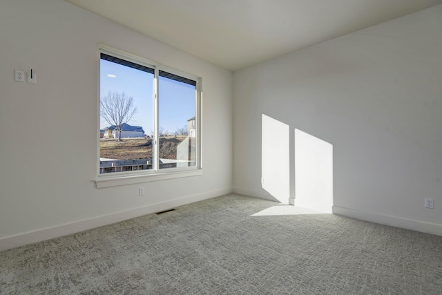 view of carpeted spare room