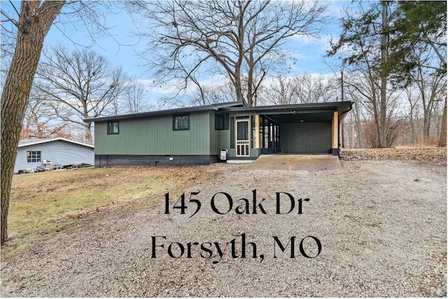 view of front of house with a carport