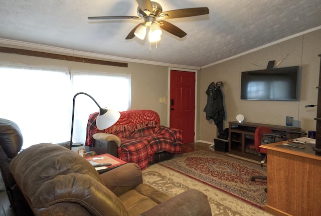 living room featuring ornamental molding and ceiling fan