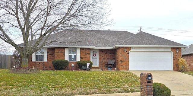 ranch-style house with a garage and a front yard