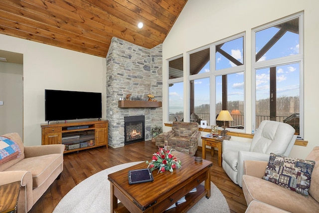 living room with dark wood-type flooring, a fireplace, high vaulted ceiling, and wooden ceiling