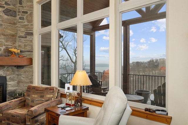 interior space featuring an outdoor stone fireplace