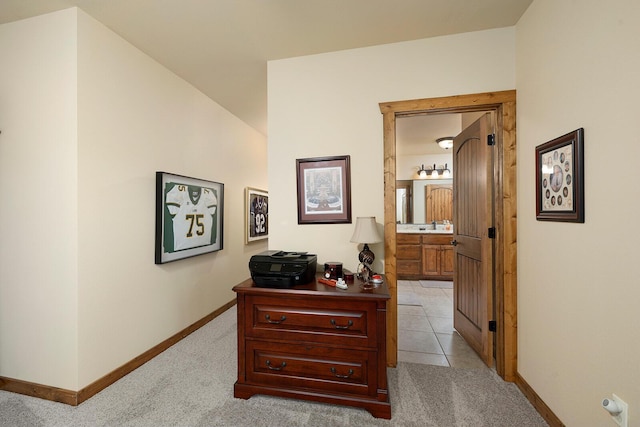 hallway with light carpet