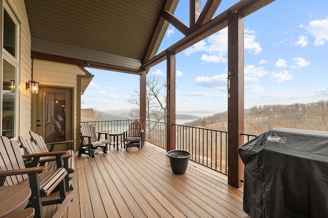 deck featuring area for grilling and a mountain view