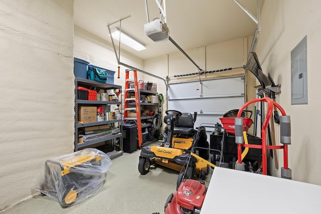 garage featuring a garage door opener and electric panel