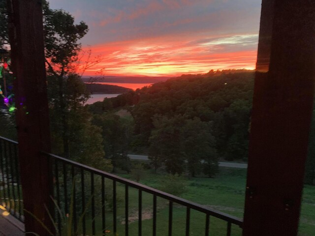 balcony at dusk with a water view