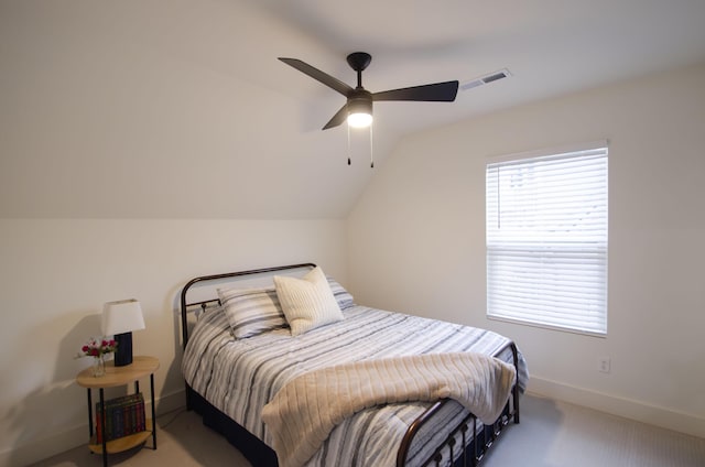 bedroom with lofted ceiling, carpet floors, and ceiling fan