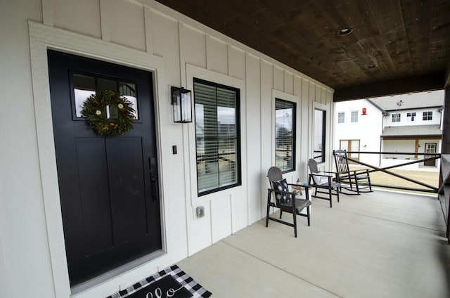 entrance to property with covered porch