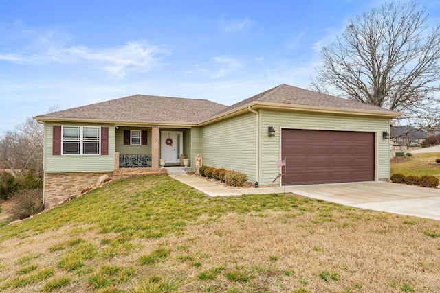 ranch-style home with a garage and a front yard