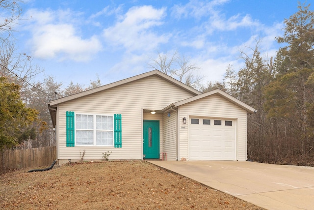 ranch-style house featuring a garage