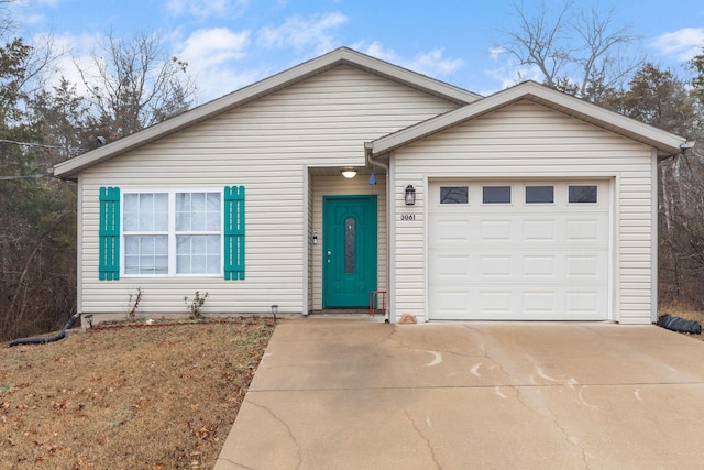 ranch-style home with a garage