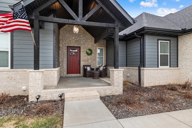 doorway to property with a patio