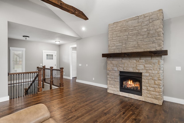 living room with a fireplace, lofted ceiling with beams, and dark hardwood / wood-style floors