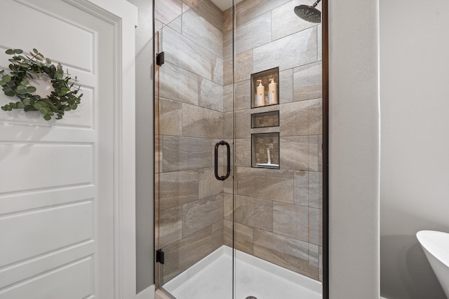 bathroom with an enclosed shower