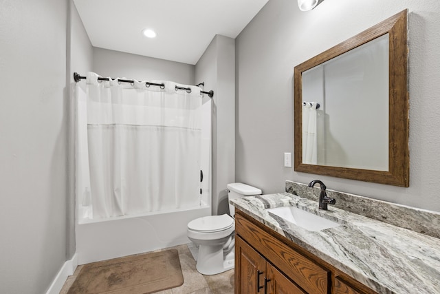 full bathroom featuring shower / tub combo with curtain, vanity, and toilet