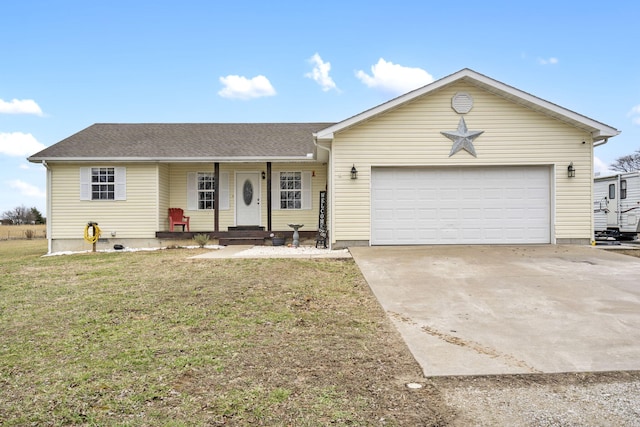 ranch-style house featuring a garage and a front yard