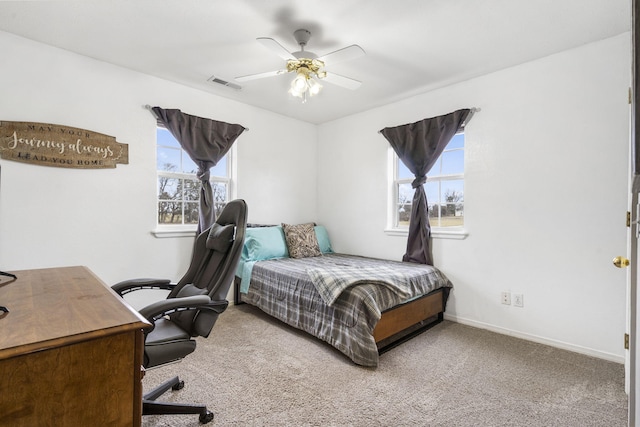 carpeted bedroom with ceiling fan