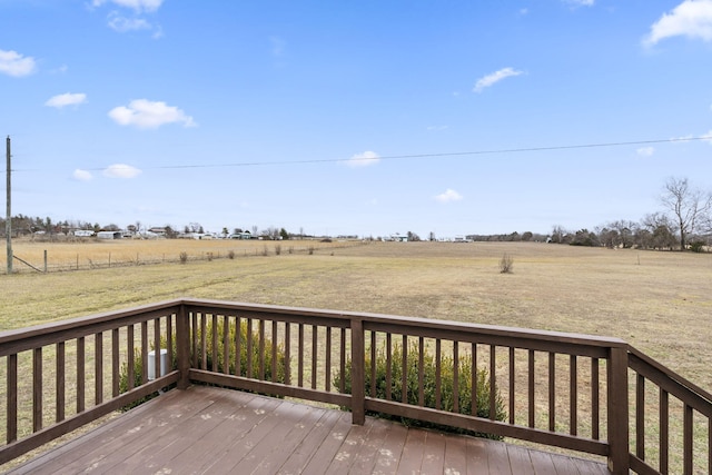 wooden terrace with a rural view