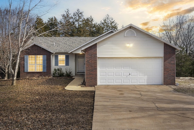 single story home with a garage