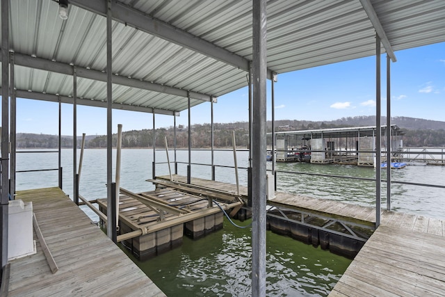 view of dock with a water view