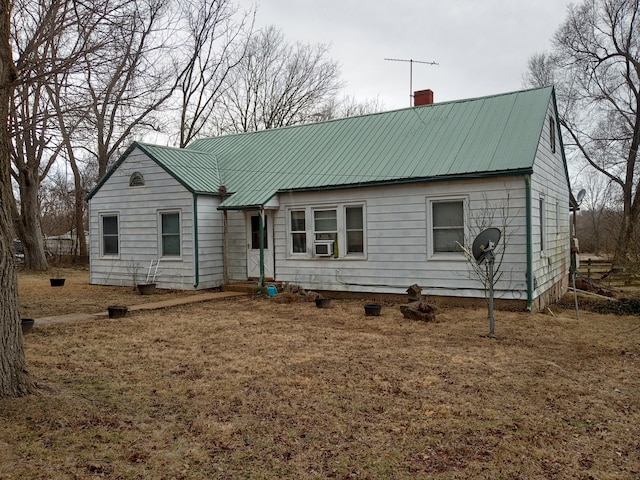 view of front of house featuring cooling unit