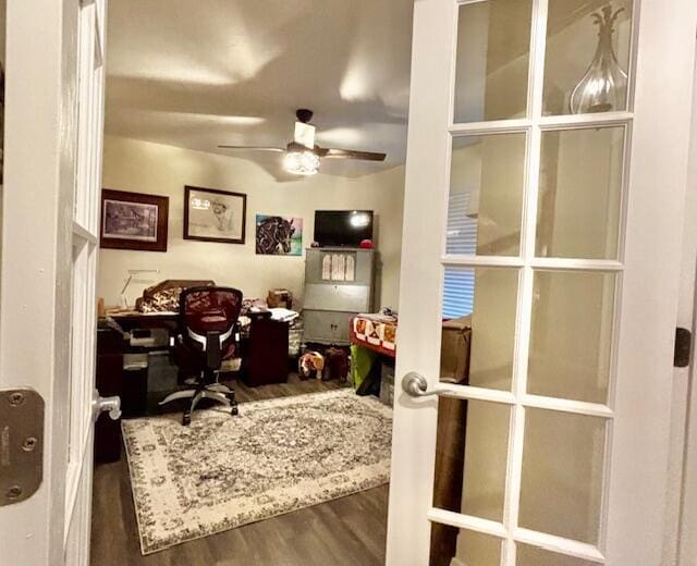 office area featuring ceiling fan and dark hardwood / wood-style flooring