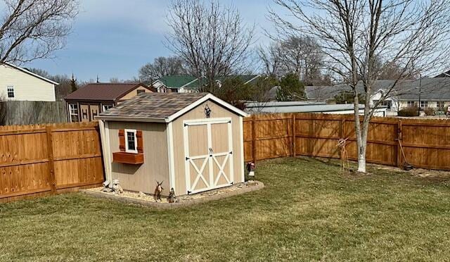 view of outdoor structure featuring a lawn