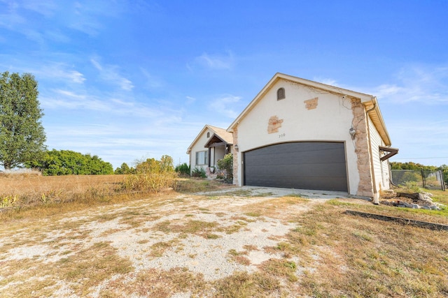 view of front of home with a garage