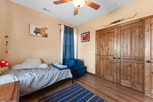 bedroom featuring ceiling fan and hardwood / wood-style floors