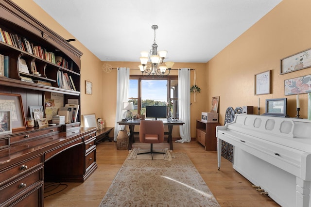 office featuring a chandelier and light hardwood / wood-style floors