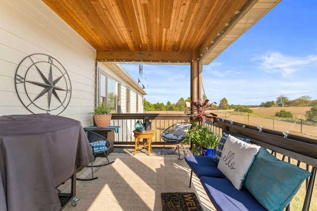 exterior space with a balcony and grilling area