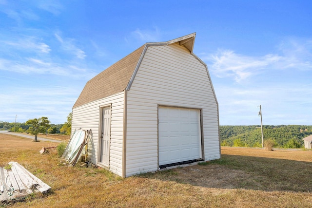 garage with a yard