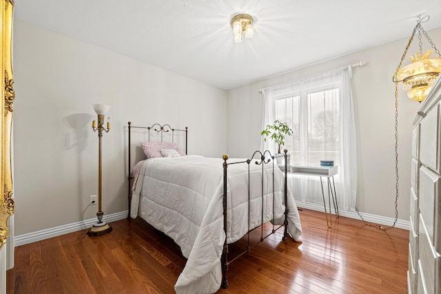 bedroom featuring dark hardwood / wood-style floors