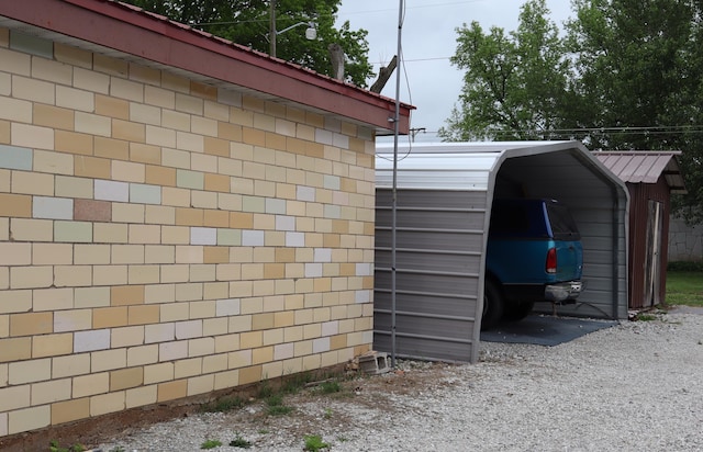 view of property exterior with a carport