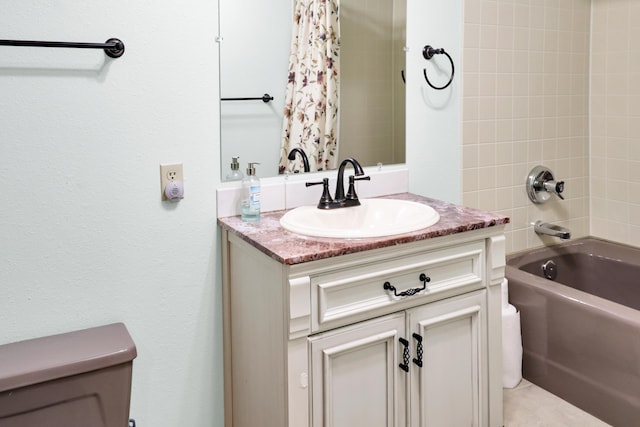 full bathroom with vanity, toilet, and shower / tub combo