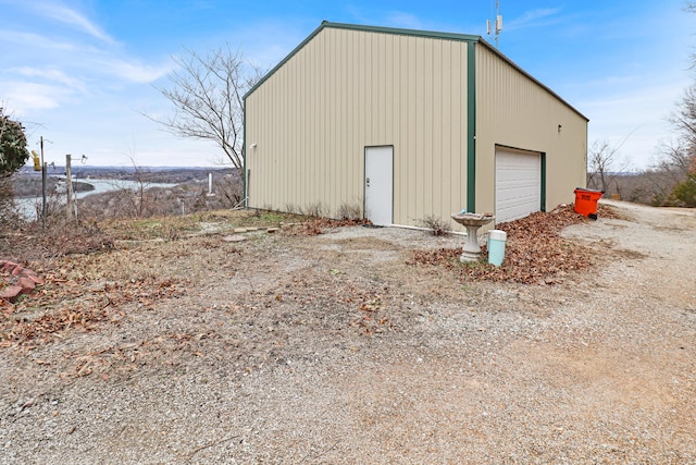 view of outdoor structure featuring a garage