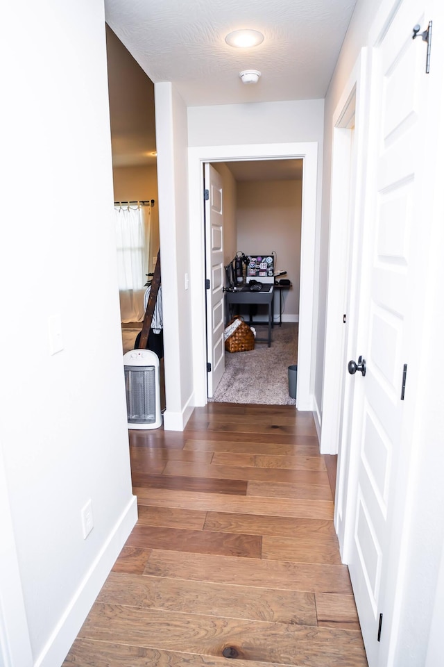 hall featuring hardwood / wood-style flooring