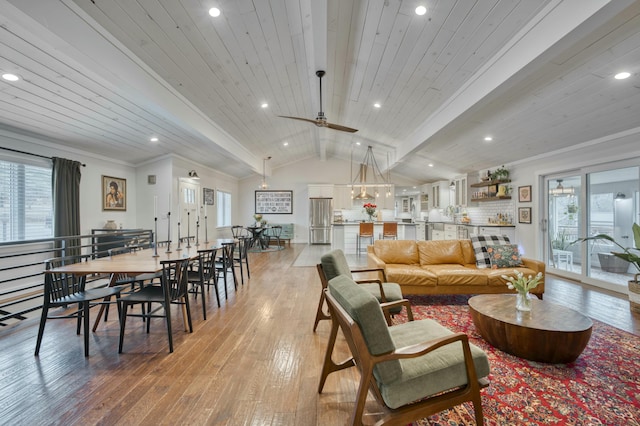 living room featuring crown molding, ceiling fan, lofted ceiling with beams, wooden ceiling, and light wood-type flooring