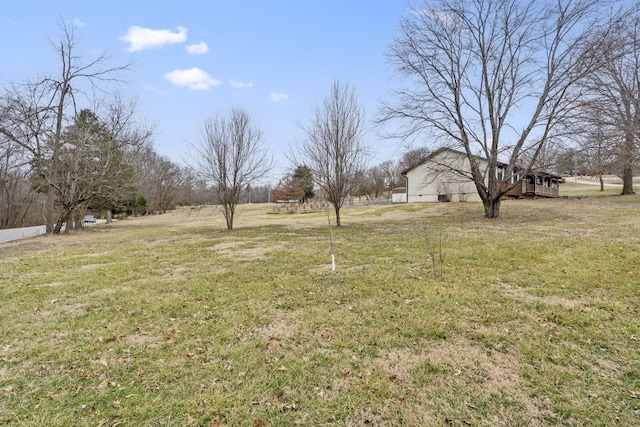 view of yard with a rural view