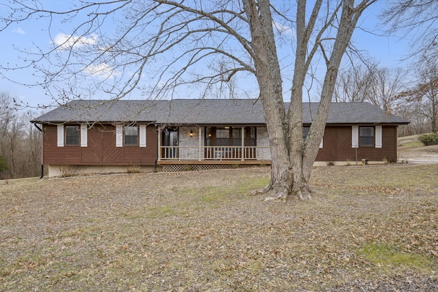 ranch-style house with covered porch