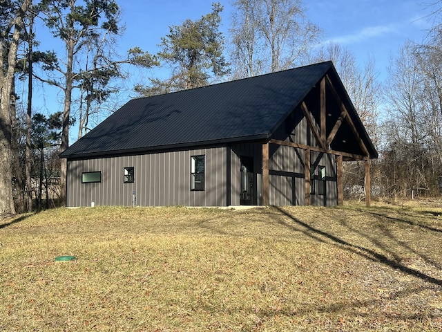 view of outbuilding with a yard