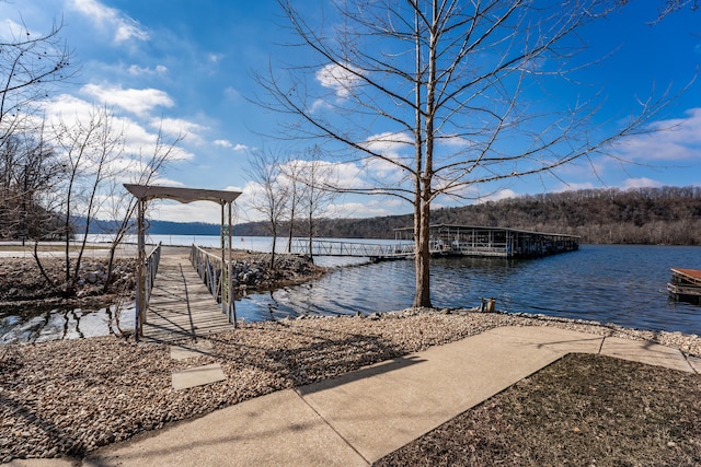 view of dock with a water view