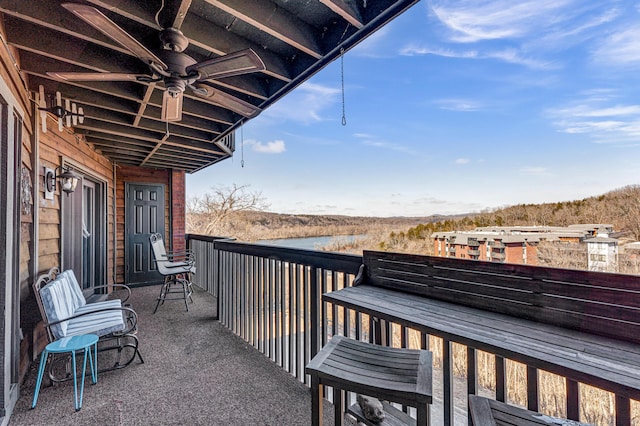 balcony featuring ceiling fan