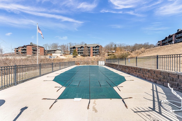 view of swimming pool featuring a patio