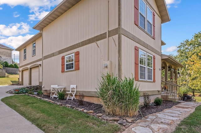 view of property exterior featuring a garage