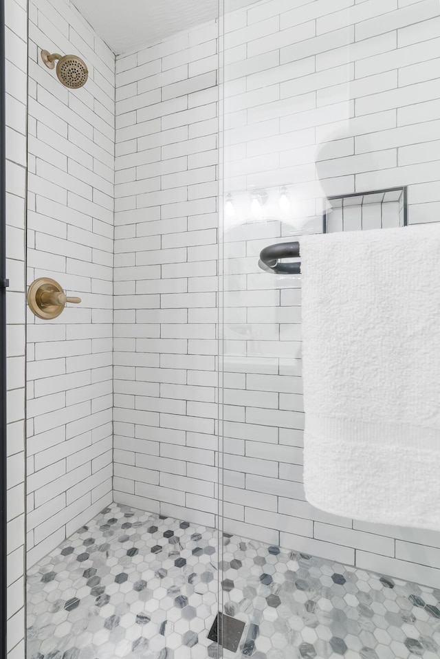 bathroom with an enclosed shower