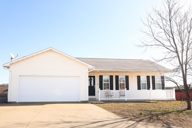 single story home with a garage and covered porch