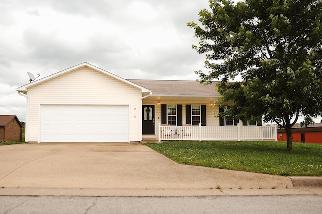 1610 Jon St, West Plains, MO 65775 - single story home with covered porch, driveway, an attached garage, and a front lawn