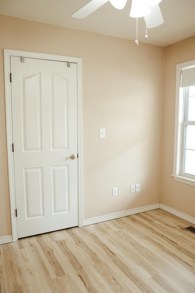 1610 Jon St, West Plains, MO 65775 - empty room featuring ceiling fan, wood finished floors, and baseboards