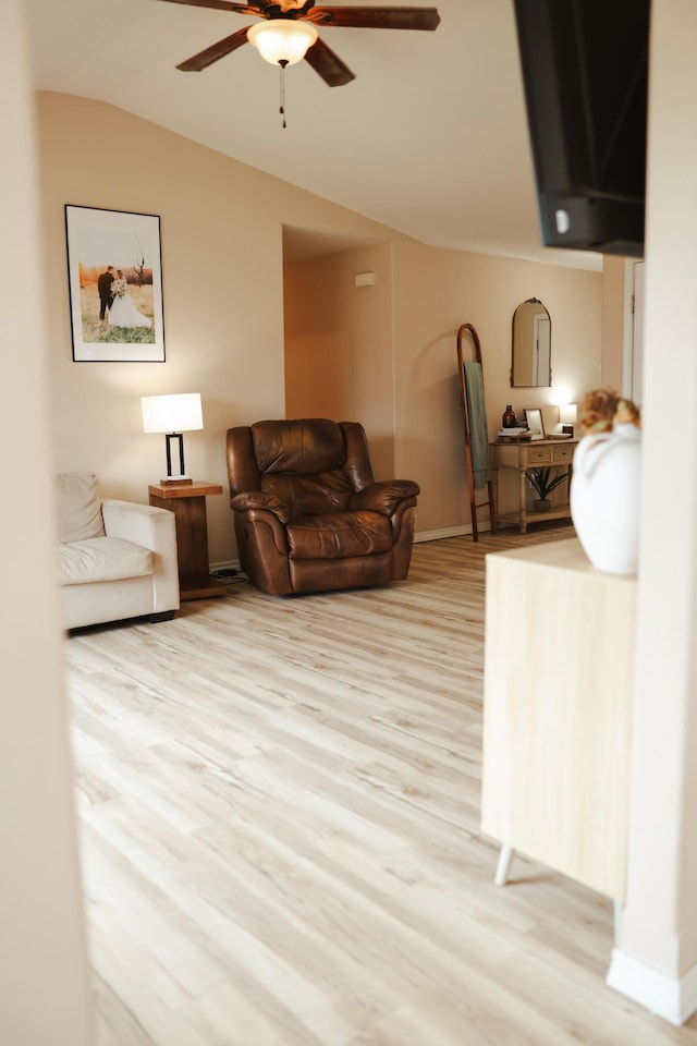 1610 Jon St, West Plains, MO 65775 - living room with a ceiling fan, wood finished floors, lofted ceiling, and baseboards